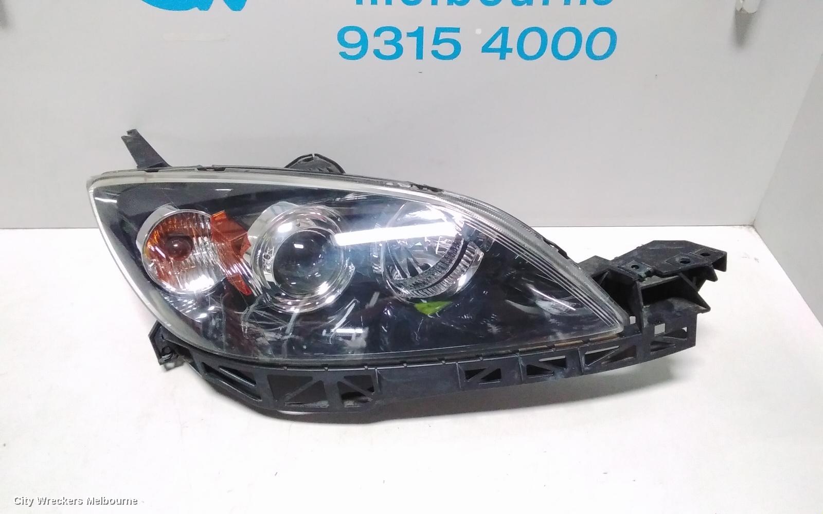 MAZDA 3 RIGHT HEADLAMP, BK, HATCH, NON HID, MANUAL ADJUST TYPE, 10/2003 - 04/2009