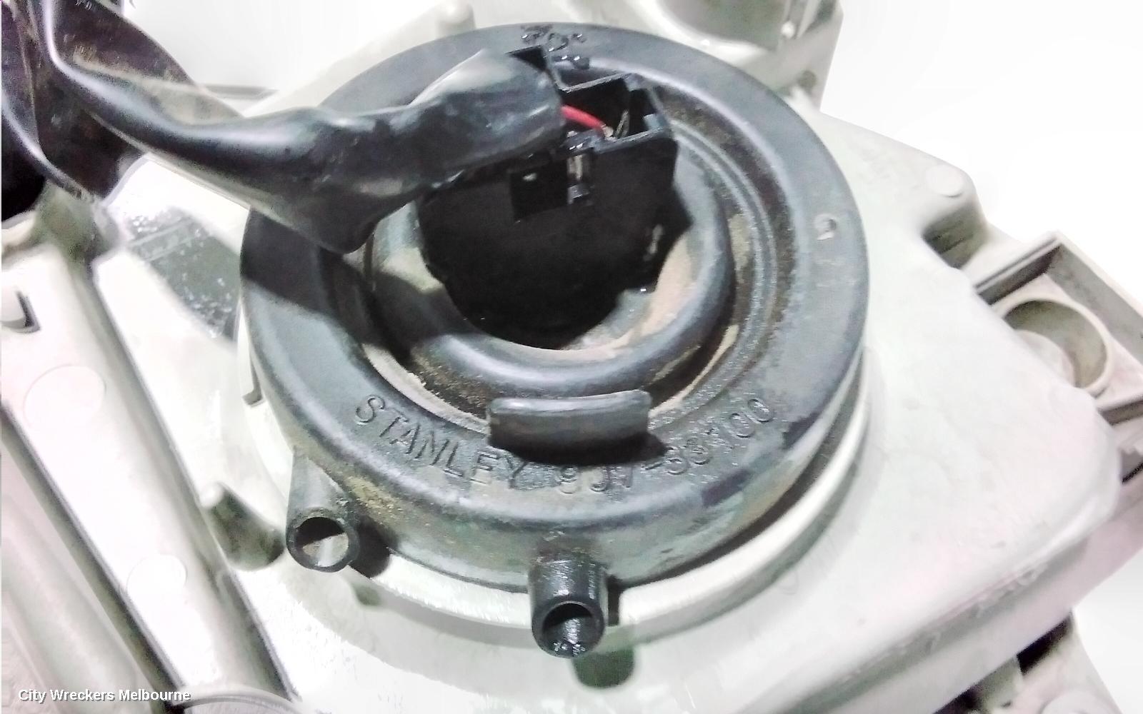 MAZDA MPV LEFT HEADLAMP, LW, LENS # STANLEY R6899, 08/1999 - 05/2002
