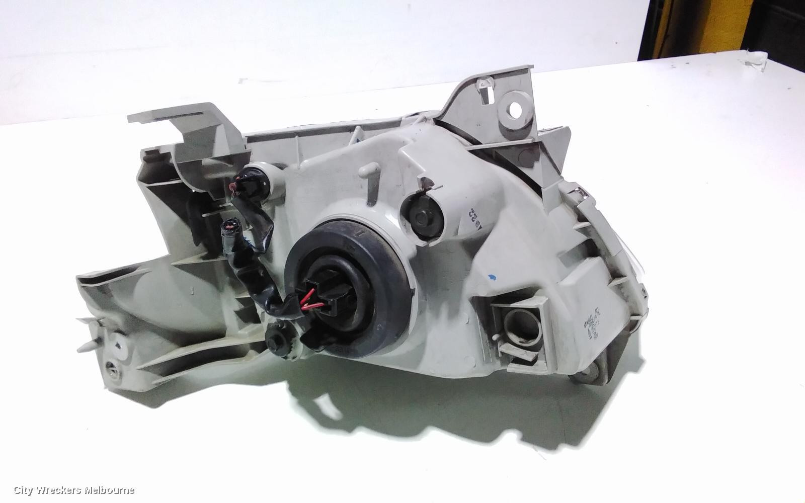 MAZDA MPV LEFT HEADLAMP, LW, LENS # STANLEY R6899, 08/1999 - 05/2002