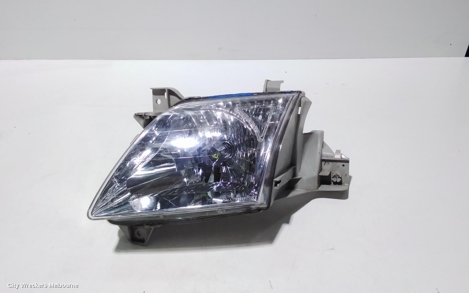 MAZDA MPV LEFT HEADLAMP, LW, LENS # STANLEY R6899, 08/1999 - 05/2002