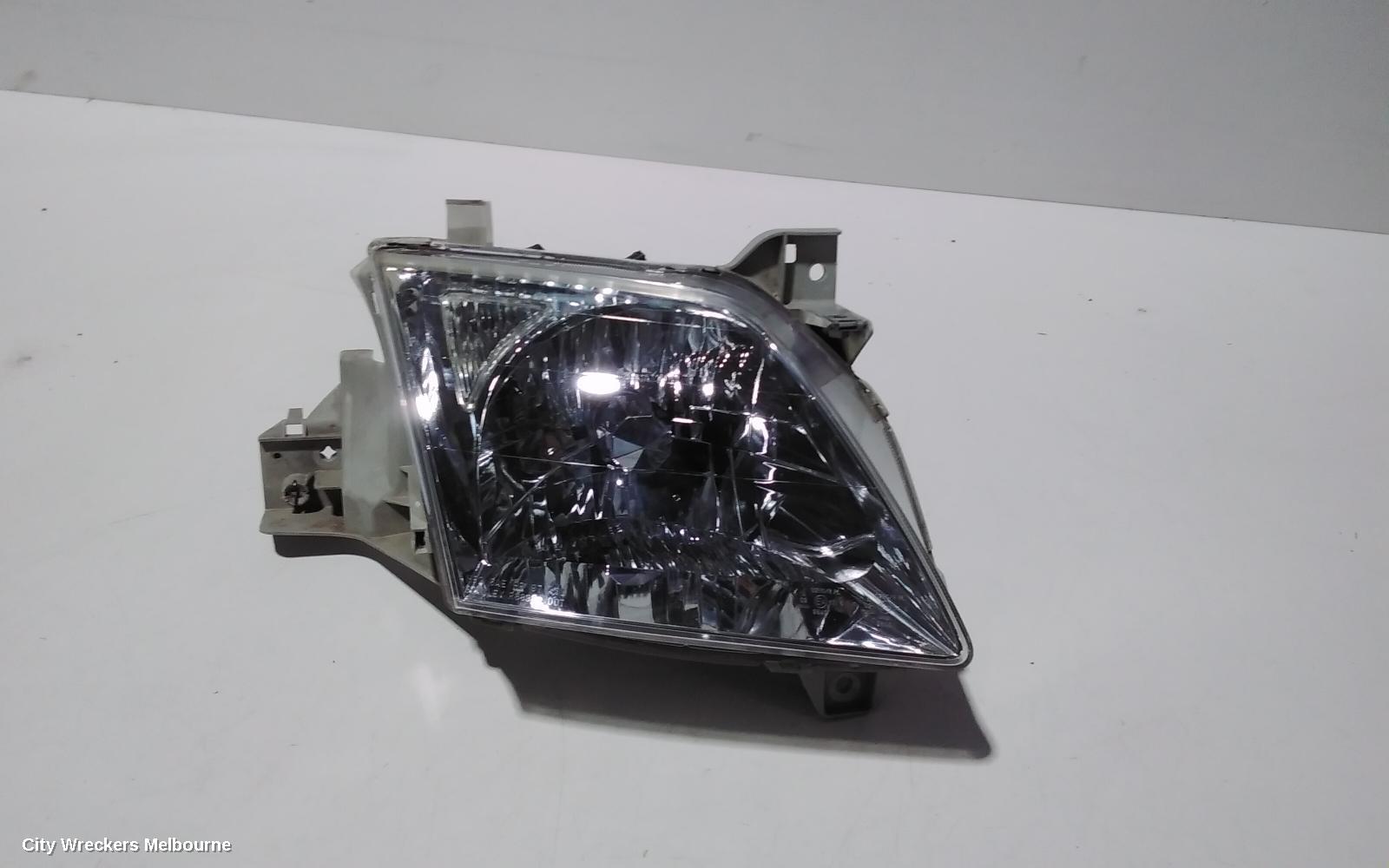 MAZDA MPV RIGHT HEADLAMP, LW, LENS # STANLEY R6899, 08/1999 - 05/2002
