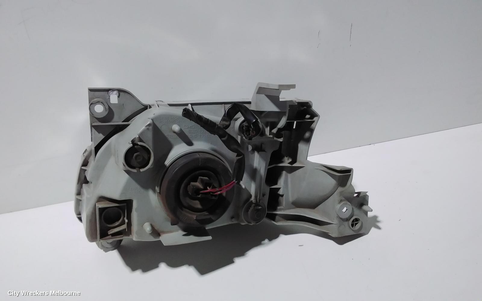 MAZDA MPV RIGHT HEADLAMP, LW, LENS # STANLEY R6899, 08/1999 - 05/2002