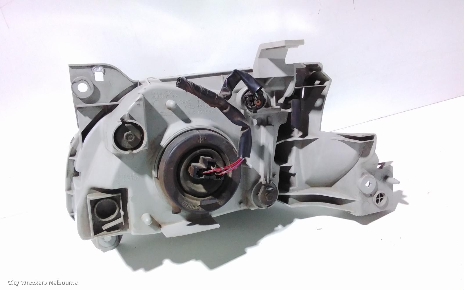MAZDA MPV RIGHT HEADLAMP, LW, LENS # STANLEY R6899, 08/1999 - 05/2002