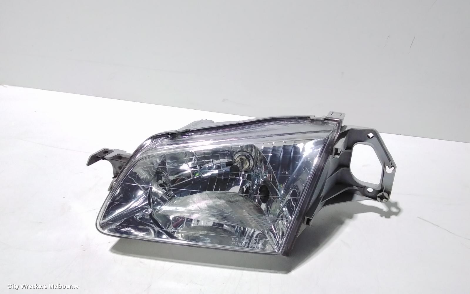 MAZDA 323 LEFT HEADLAMP, BJ, P/N B25D510L0, 09/1998 - 03/2001