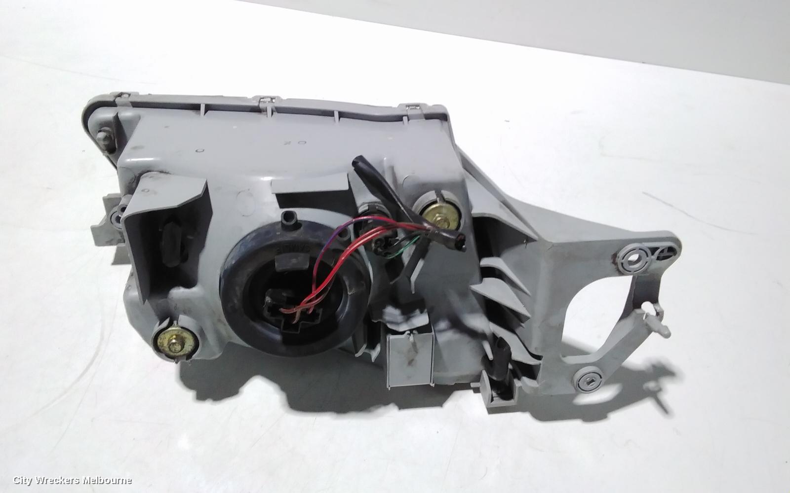 MAZDA 323 LEFT HEADLAMP, BJ, P/N B25D510L0, 09/1998 - 03/2001
