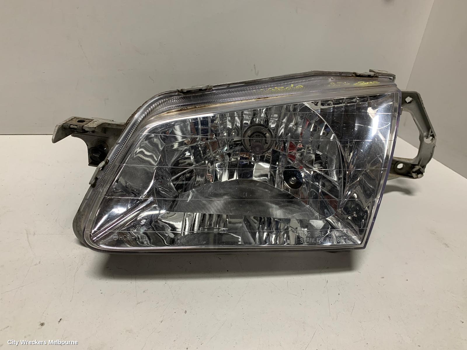 MAZDA 323 LEFT HEADLAMP, BJ, P/N B25D510L0, 09/1998 - 03/2001