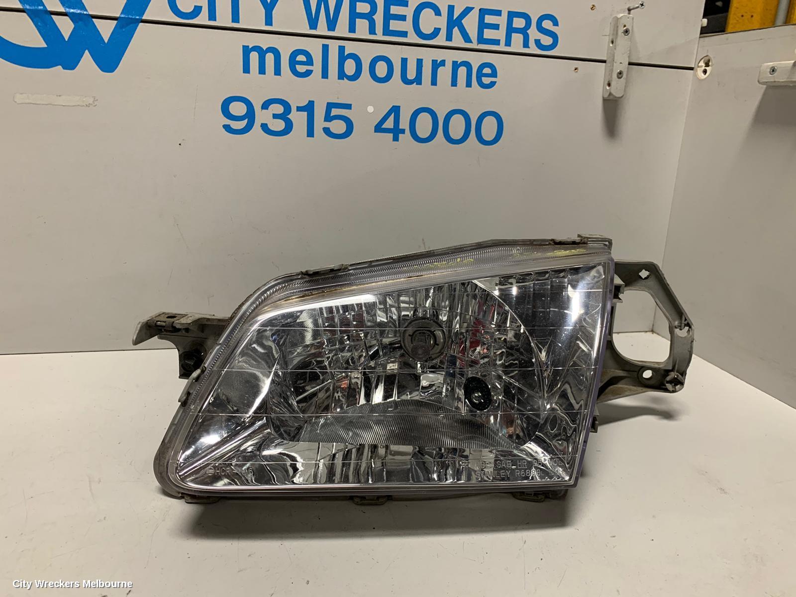 MAZDA 323 LEFT HEADLAMP, BJ, P/N B25D510L0, 09/1998 - 03/2001
