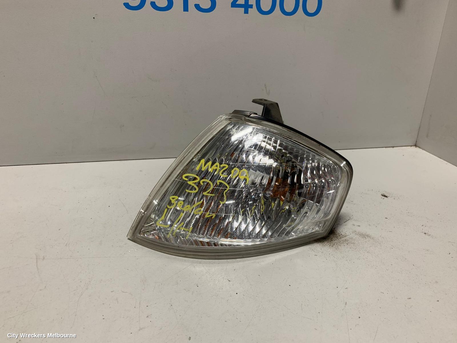 MAZDA 323 LEFT INDICATOR/FOG/SIDE, CORNER LAMP, P/N B25D51070B, BJ, 09/1998 - 03/2001