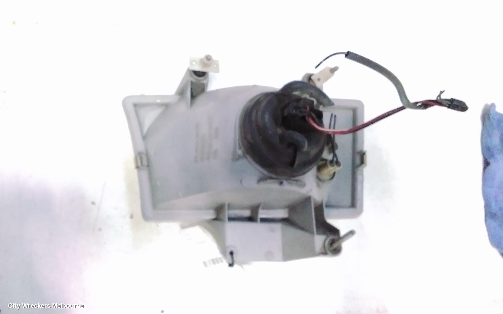 MAZDA BRAVO RIGHT HEADLAMP, LENS NUMBER 100-16020 02/1999 - 10/2002