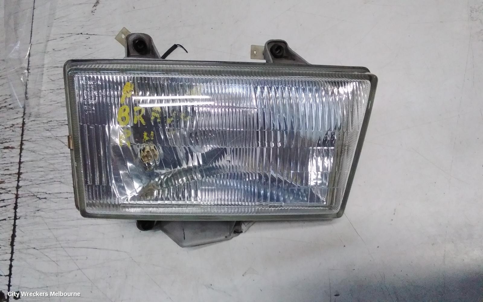 MAZDA BRAVO RIGHT HEADLAMP, LENS NUMBER 100-16020 02/1999 - 10/2002