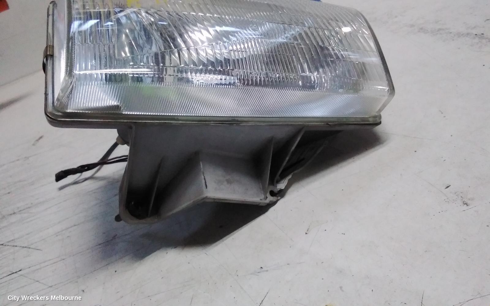 MAZDA BRAVO RIGHT HEADLAMP, LENS NUMBER 100-16020 02/1999 - 10/2002