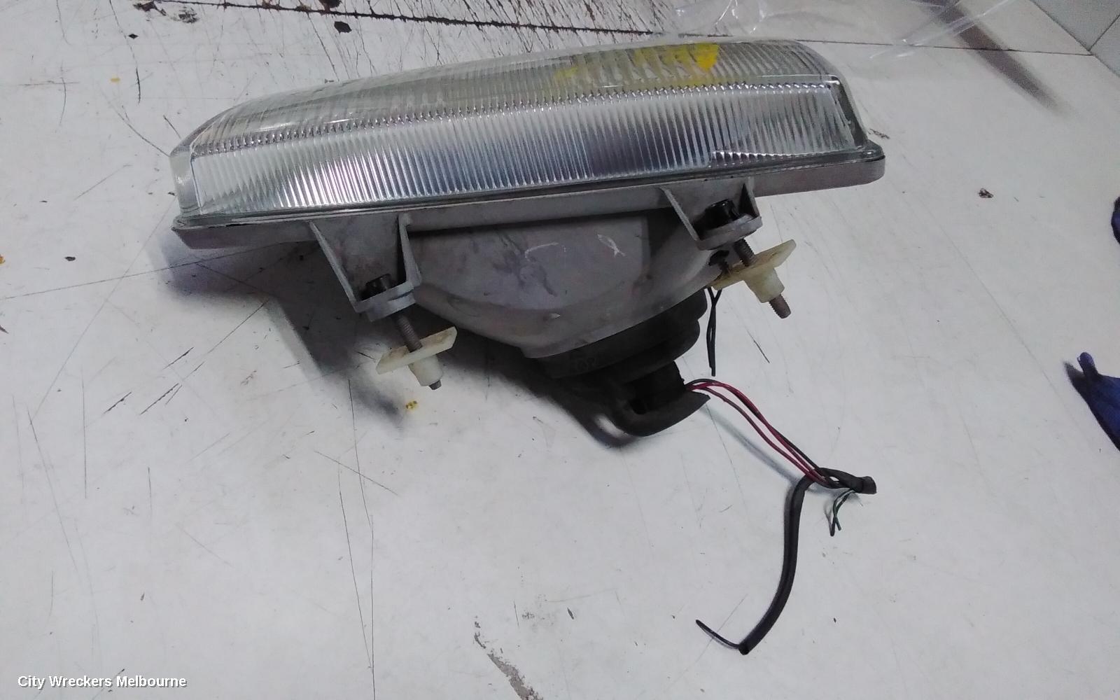 MAZDA BRAVO RIGHT HEADLAMP, LENS NUMBER 100-16020 02/1999 - 10/2002