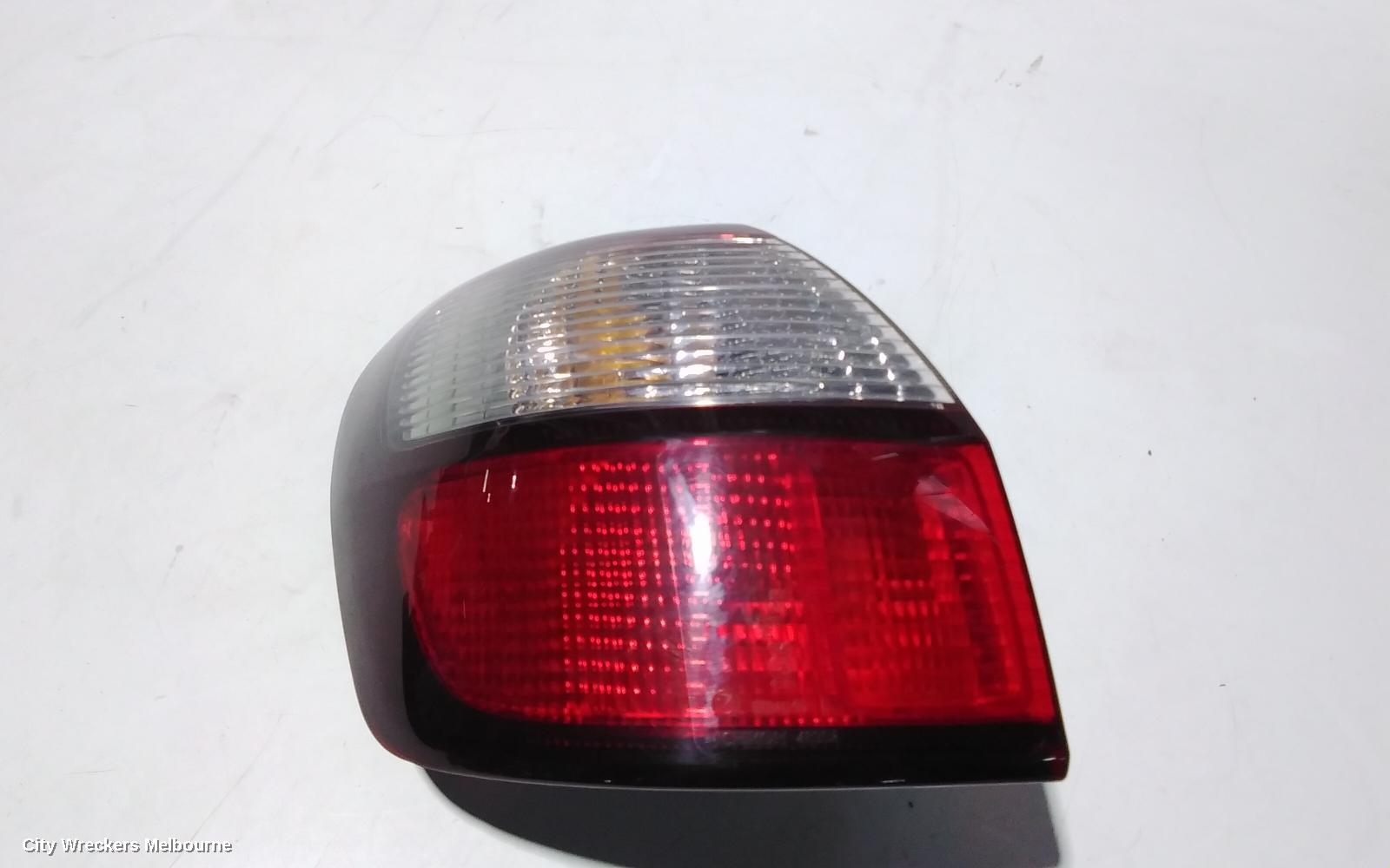 SUBARU OUTBACK LEFT TAILLIGHT, 3RD GEN ICHIKOH 4836A 12/1998 - 08/2003