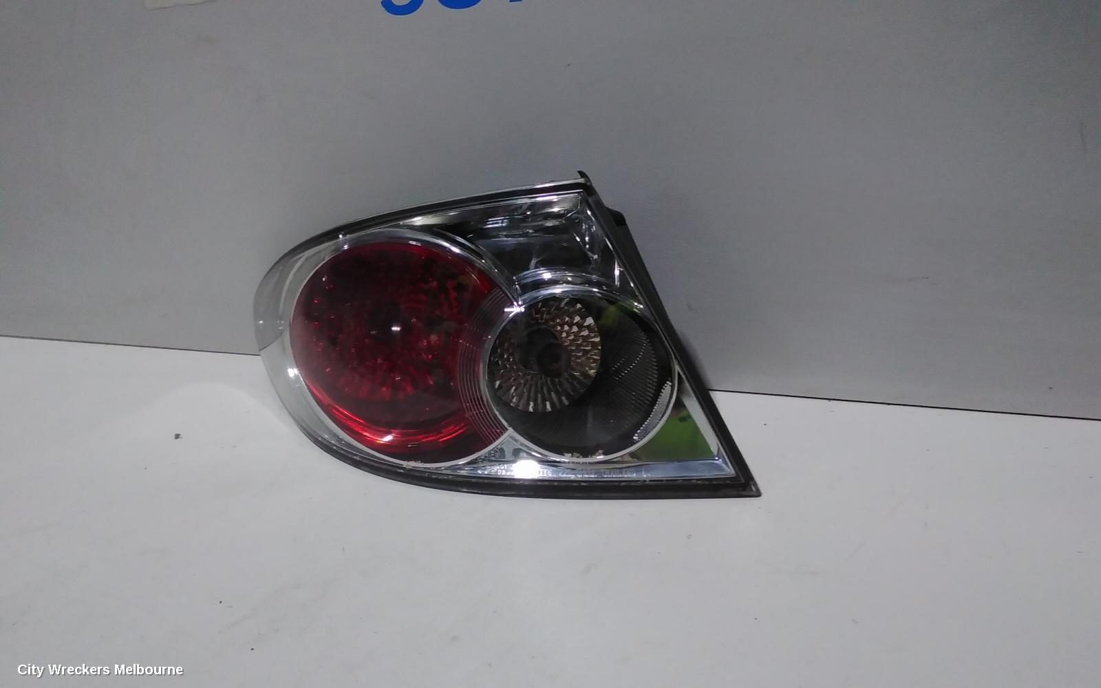 MAZDA 6 LEFT TAILLIGHT, GG/GY, SEDAN/HATCH, LENS# 220-61971, 09/2002 - 08/2005