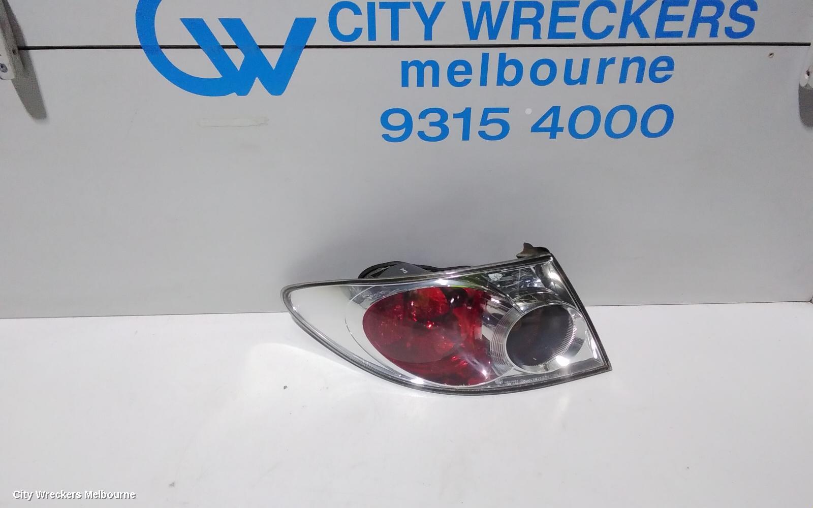 MAZDA 6 LEFT TAILLIGHT, GG/GY, SEDAN/HATCH, LENS# 220-61971, 09/2002 - 08/2005