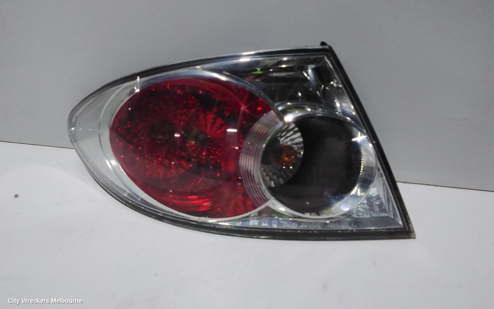 MAZDA 6 LEFT TAILLIGHT, GG/GY, SEDAN/HATCH, LENS# 220-61971, 09/2002 - 08/2005