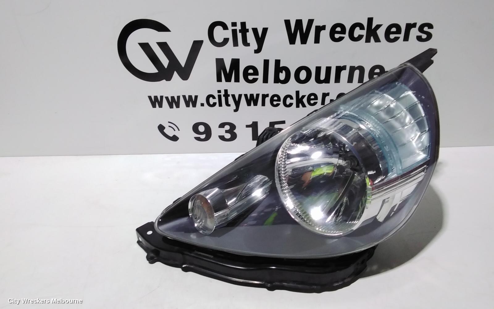 HONDA JAZZ LEFT HEADLAMP, GD, 1.3 ENG, BLACK INSERT TYPE, LENS# 4944, 10/2004 - 09/2008