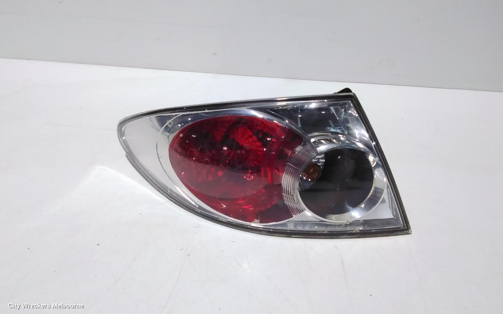 MAZDA 6 LEFT TAILLIGHT, GG/GY, SEDAN/HATCH, LENS# 220-61971, 09/2002 - 08/2005