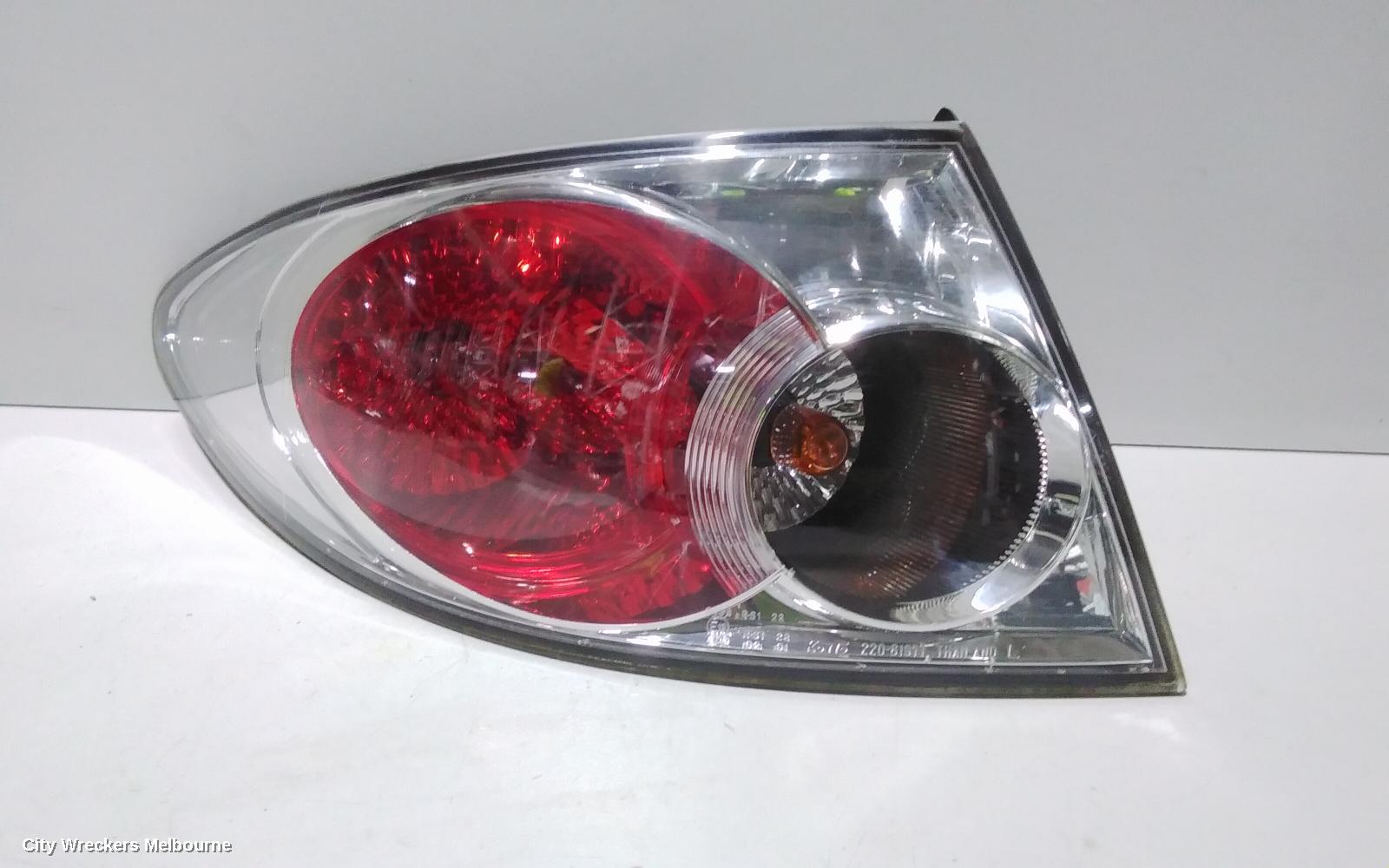 MAZDA 6 LEFT TAILLIGHT, GG/GY, SEDAN/HATCH, LENS# 220-61971, 09/2002 - 08/2005
