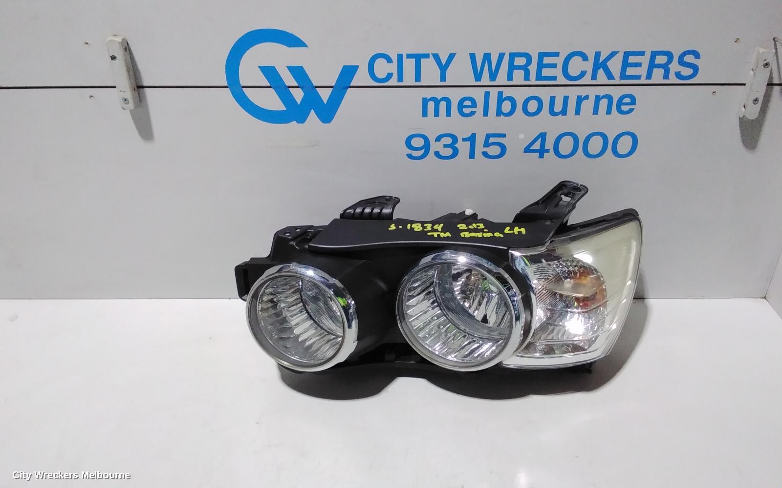 HOLDEN BARINA LEFT HEADLAMP, TM, W/ CHROME RING TYPE, 08/2011 - 08/2016