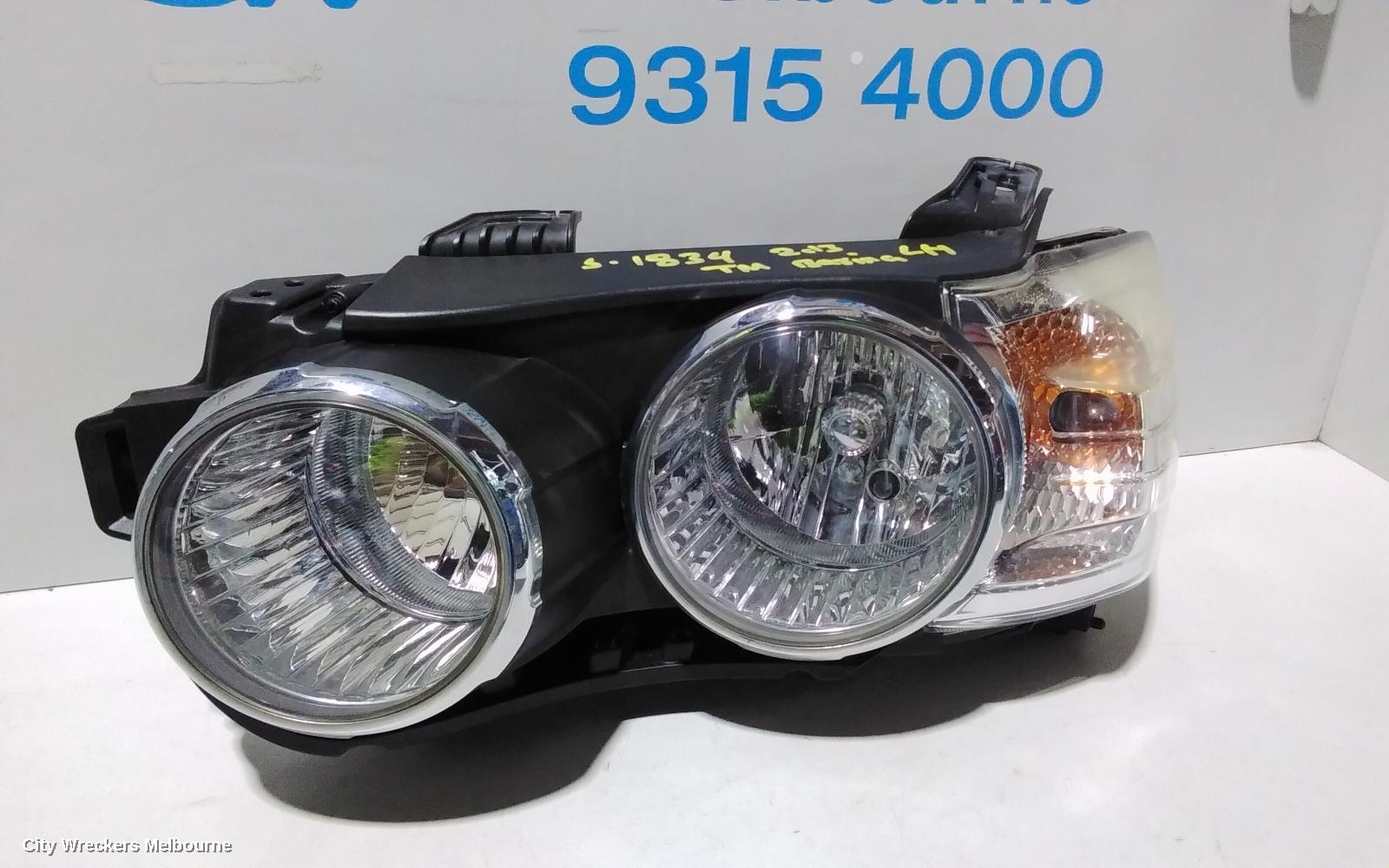 HOLDEN BARINA LEFT HEADLAMP, TM, W/ CHROME RING TYPE, 08/2011 - 08/2016