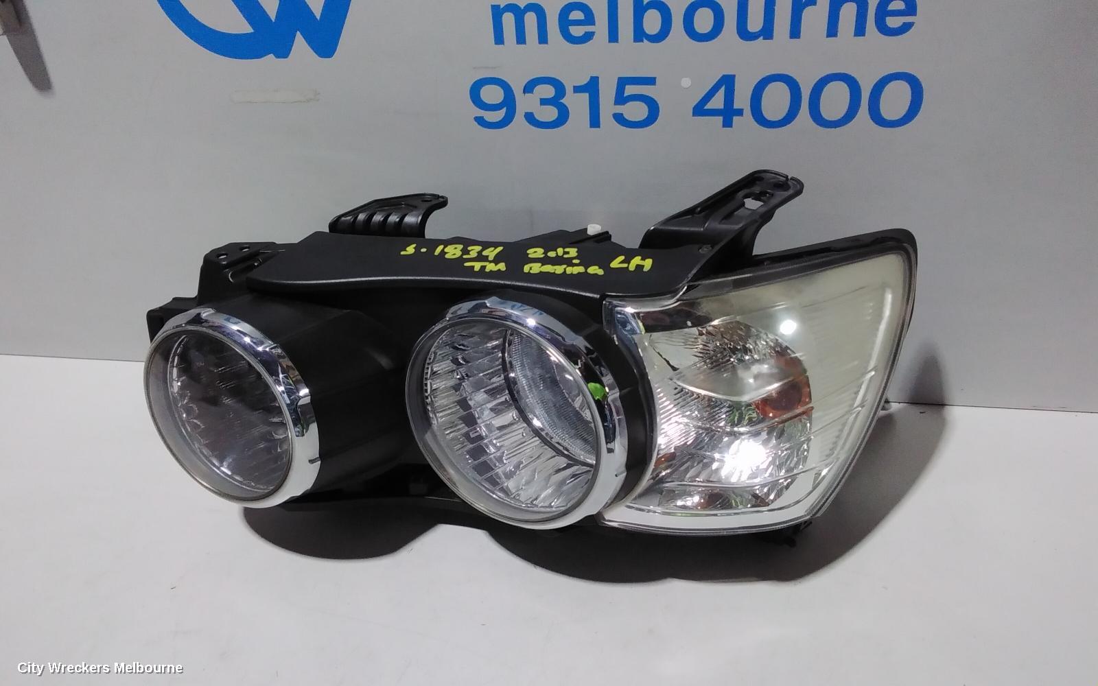 HOLDEN BARINA LEFT HEADLAMP, TM, W/ CHROME RING TYPE, 08/2011 - 08/2016