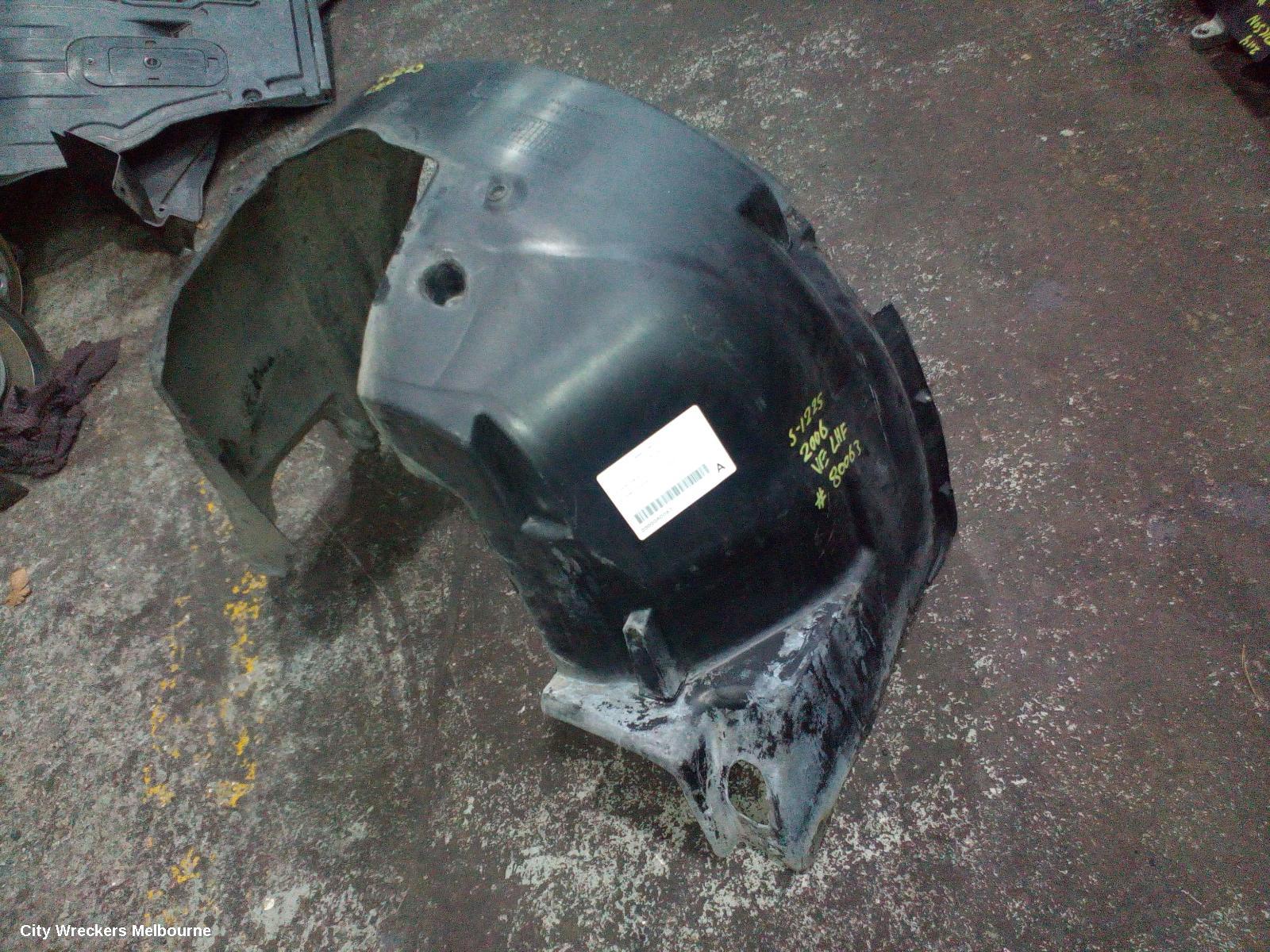HOLDEN COMMODORE LEFT GUARD LINER, VE, FRONT, 08/2006 - 04/2013