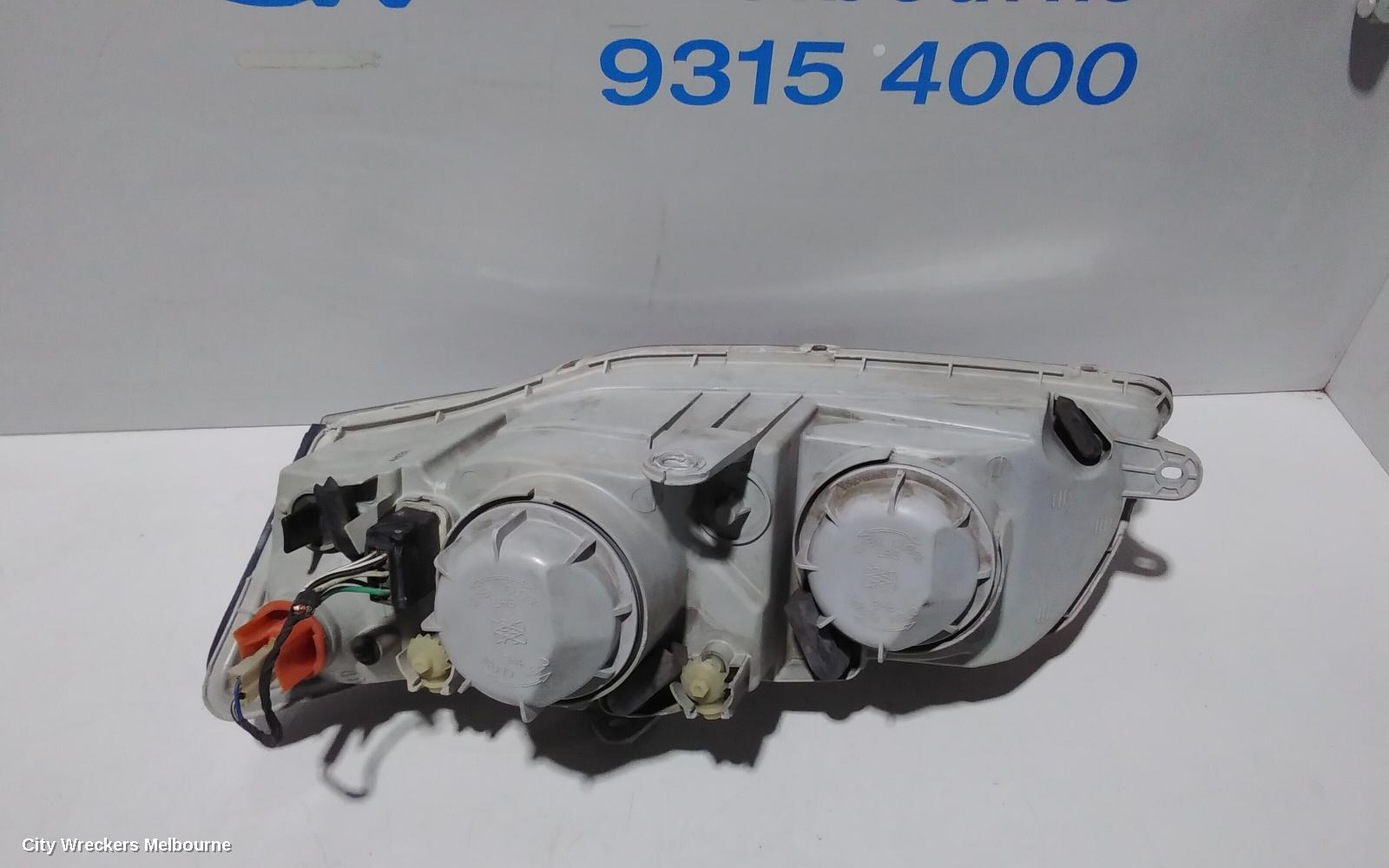HOLDEN COMMODORE RIGHT HEADLAMP, VZ, ADVENTRA/BERLINA, PROJECTOR TYPE (CHROME), 08/2004 - 09/2007