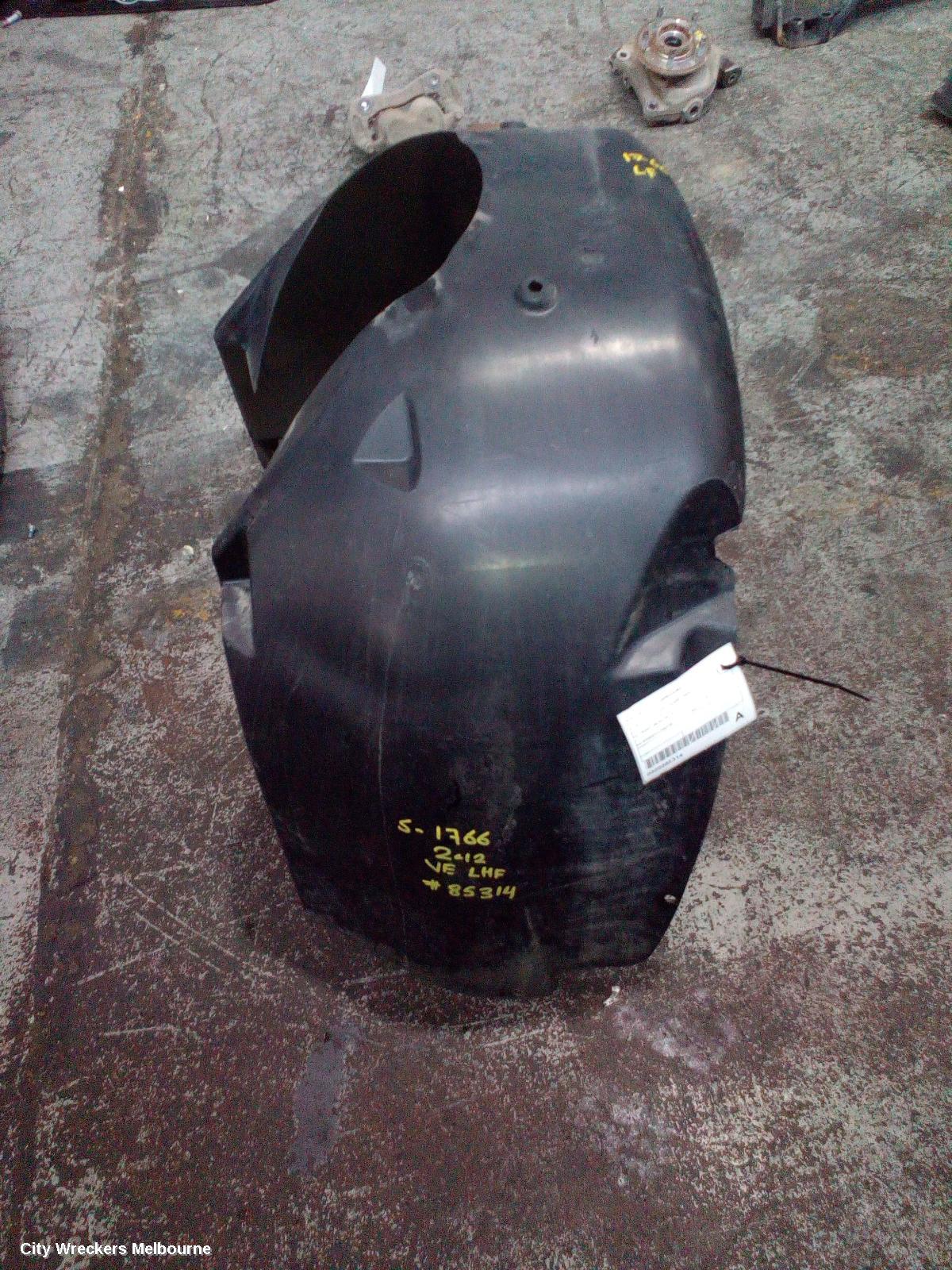 HOLDEN COMMODORE LEFT GUARD LINER, VE, FRONT, 08/2006 - 04/2013