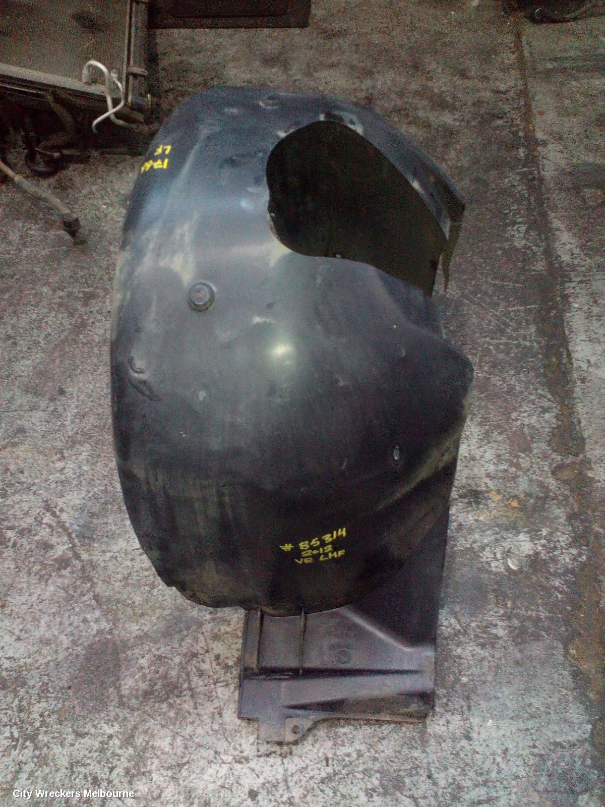 HOLDEN COMMODORE LEFT GUARD LINER, VE, FRONT, 08/2006 - 04/2013