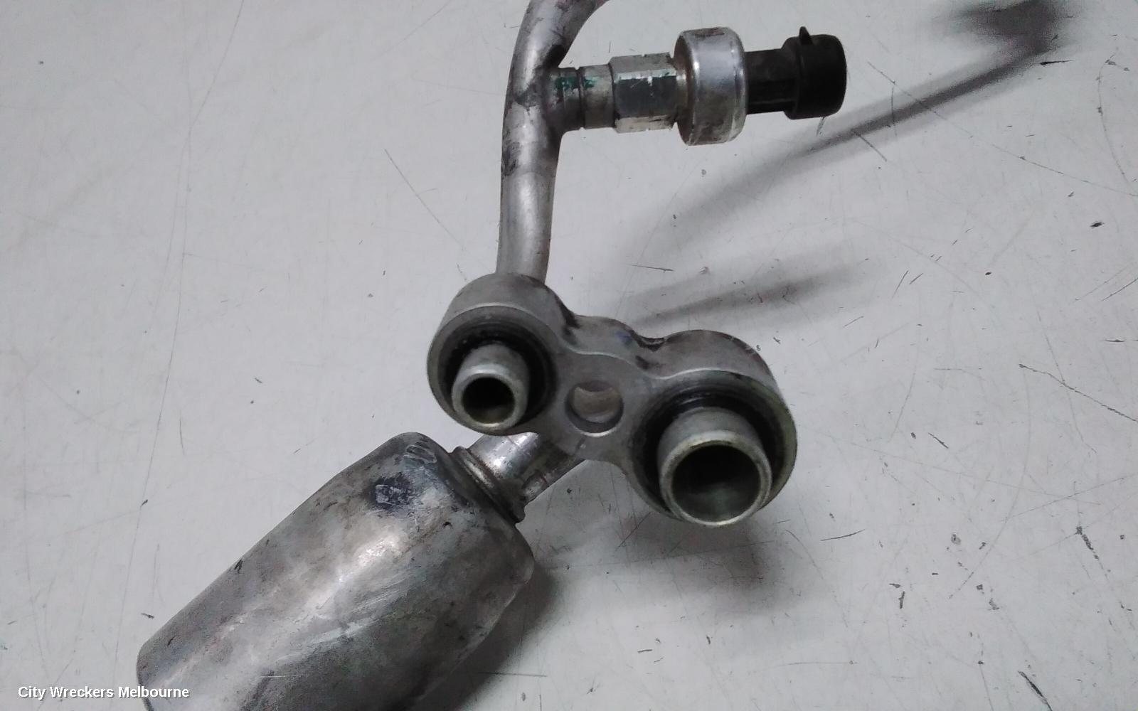 HOLDEN COMMODORE A/C HOSES, PETROL, 3.6, LY7, COMPRESSOR TO CONDENSER, VE, 08/2006 - 08/2009
