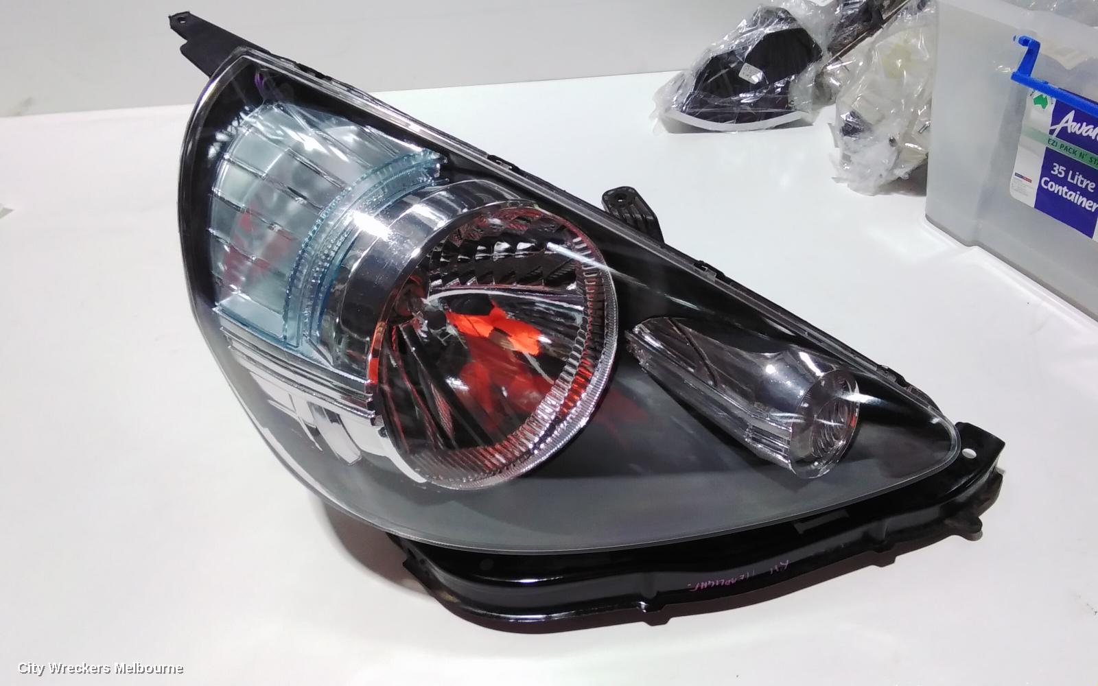 HONDA JAZZ RIGHT HEADLAMP, GD, 1.3 ENG, BLACK INSERT TYPE, LENS# 4944, 10/2004 - 09/2008