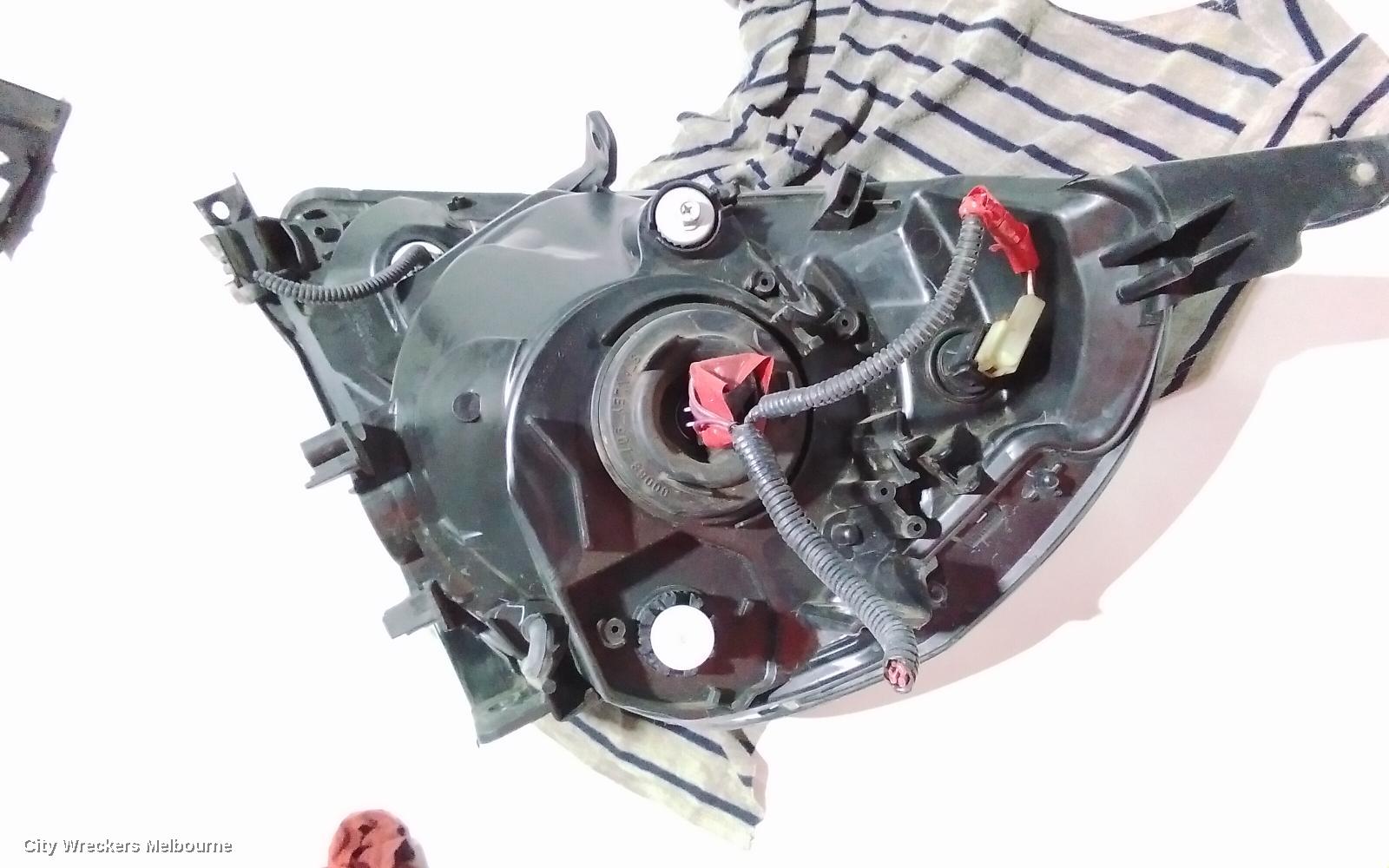 HONDA JAZZ RIGHT HEADLAMP, GD, 1.3 ENG, BLACK INSERT TYPE, LENS# 4944, 10/2004 - 09/2008