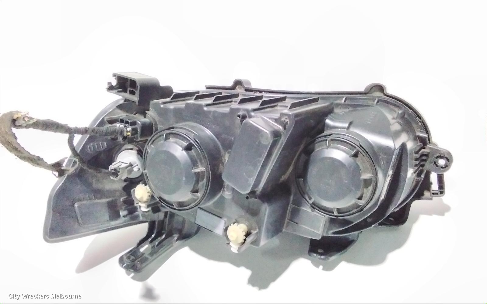 HOLDEN BARINA RIGHT HEADLAMP, TM, W/ CHROME RING TYPE, 08/2011 - 08/2016
