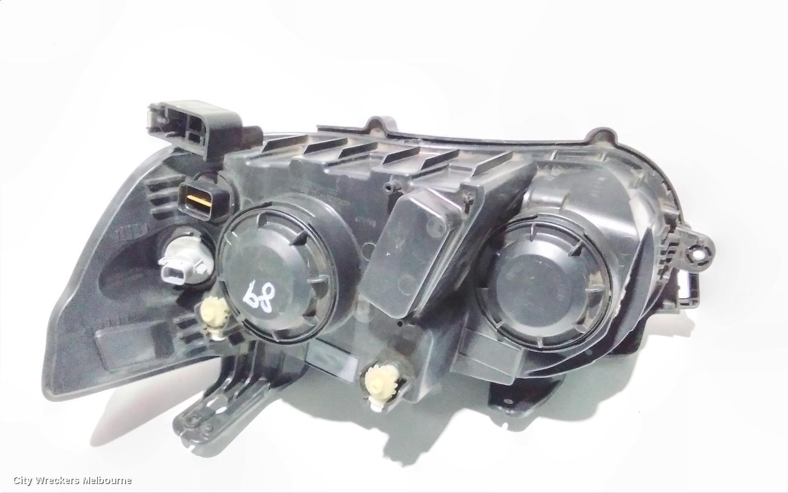 HOLDEN BARINA RIGHT HEADLAMP, TM, W/ CHROME RING TYPE, 08/2011 - 08/2016