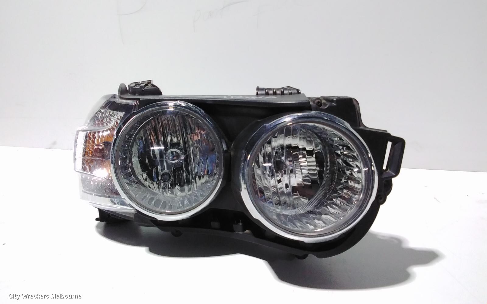 HOLDEN BARINA RIGHT HEADLAMP, TM, W/ CHROME RING TYPE, 08/2011 - 08/2016