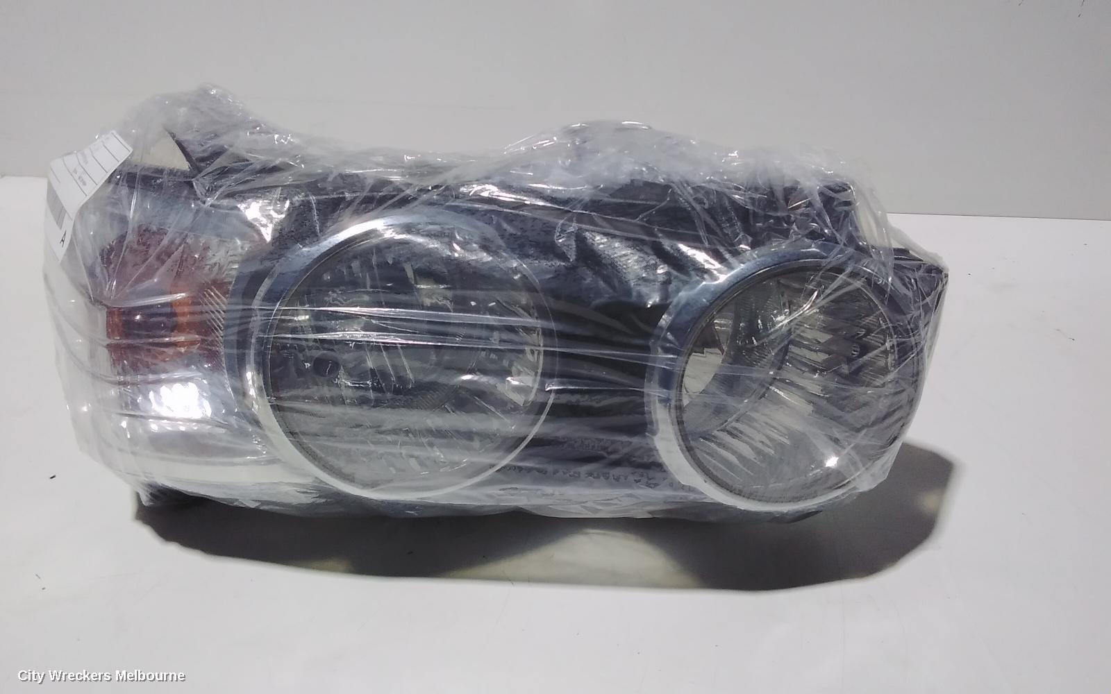 HOLDEN BARINA RIGHT HEADLAMP, TM, W/ CHROME RING TYPE, 08/2011 - 08/2016