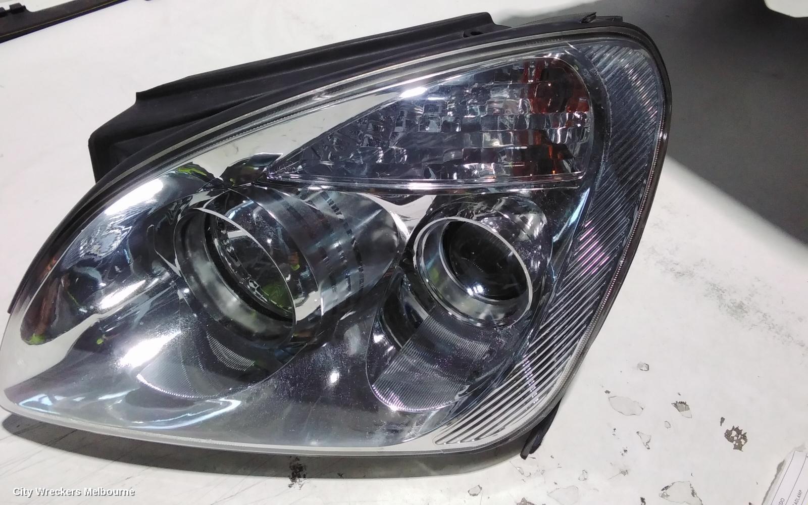 KIA RONDO LEFT HEADLAMP, UN, 12/2006 - 09/2009