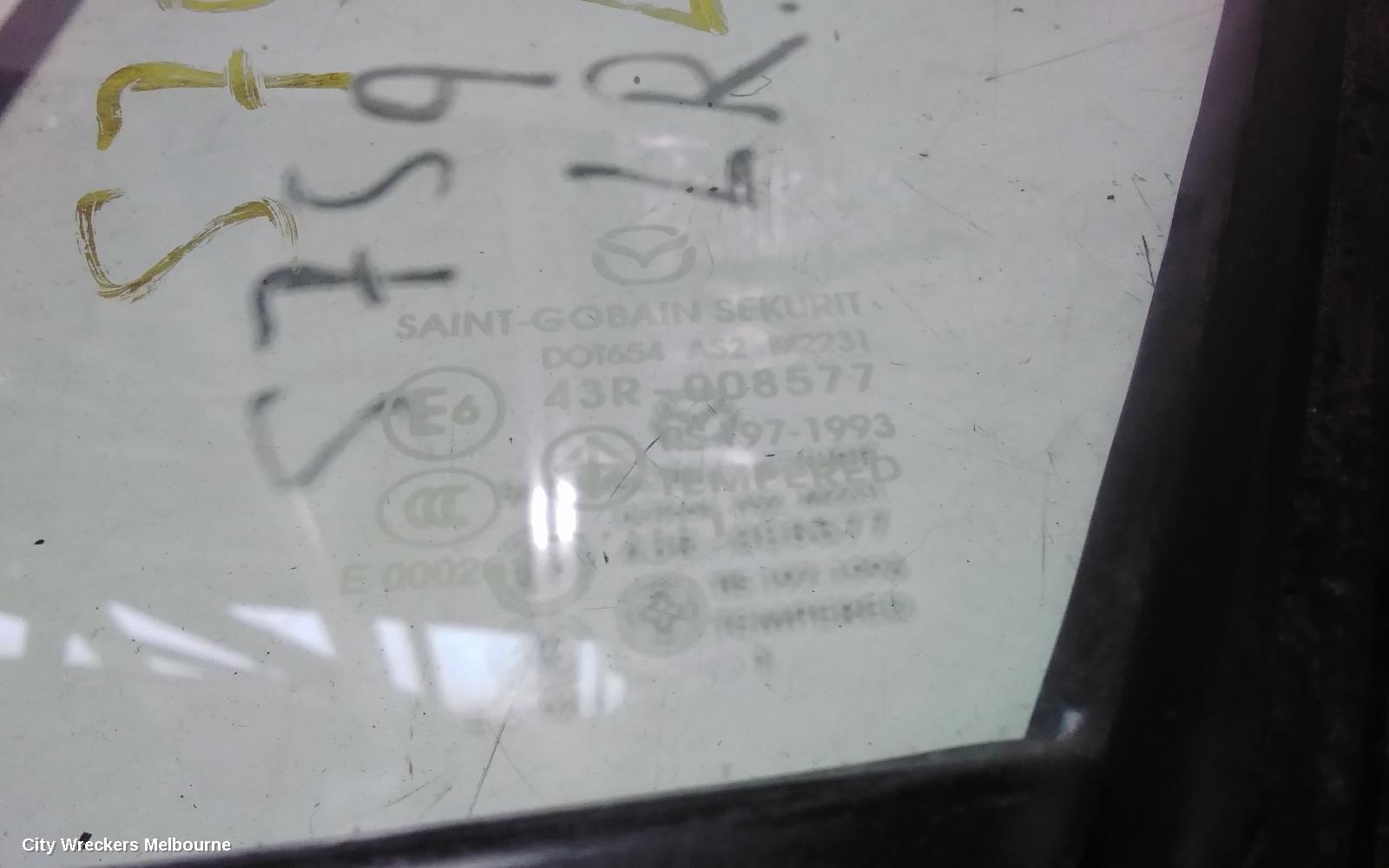MAZDA 3 LEFT REAR 1/4 DOOR GLASS, BL, STANDARD TINT TYPE, SEDAN, 04/2009 - 10/2013