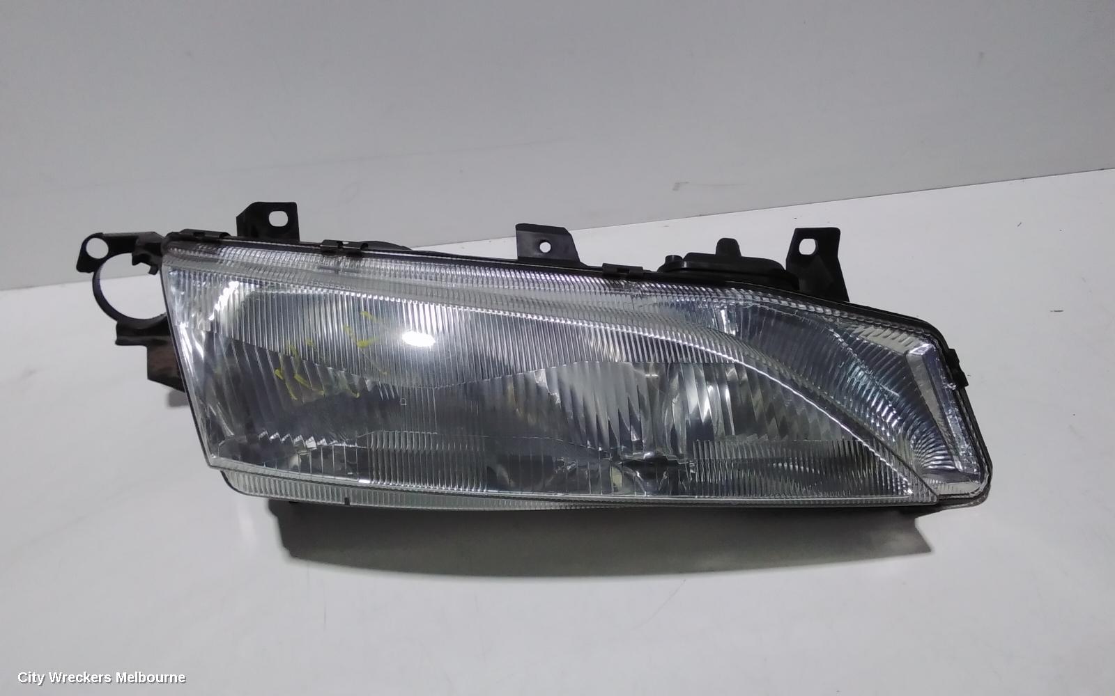 FORD FALCON RIGHT HEADLAMP, EL, SEDAN/WAGON, 10/1996 - 09/1998