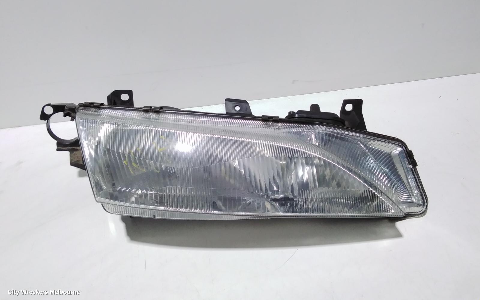 FORD FALCON RIGHT HEADLAMP, EL, SEDAN/WAGON, 10/1996 - 09/1998