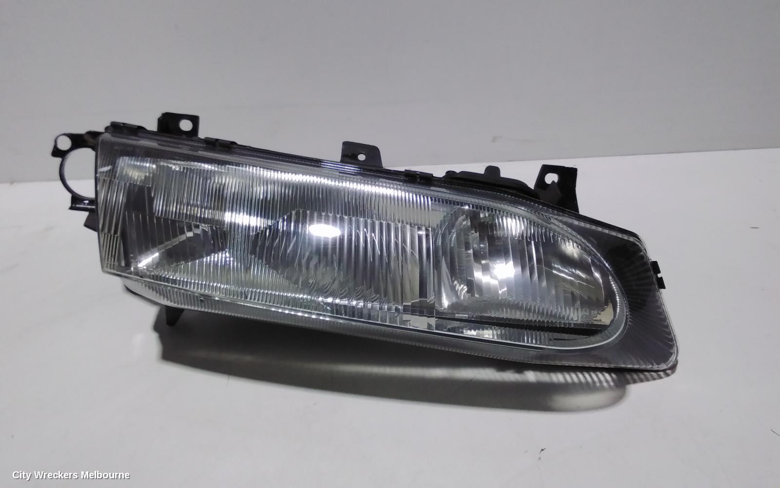 FORD FALCON RIGHT HEADLAMP, EL, SEDAN/WAGON, 10/1996 - 09/1998