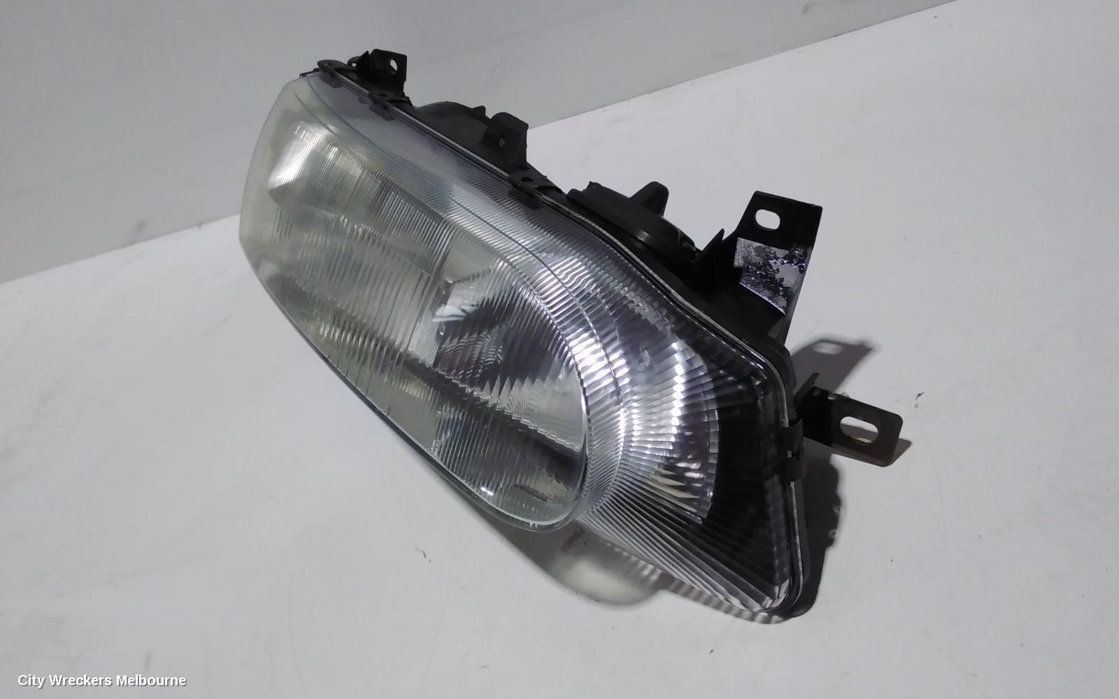 FORD FALCON RIGHT HEADLAMP, EL, SEDAN/WAGON, 10/1996 - 09/1998
