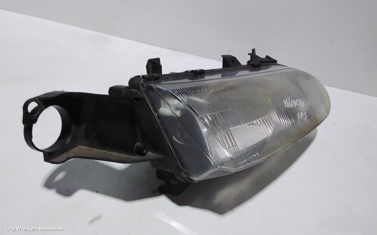 FORD FALCON RIGHT HEADLAMP, EL, SEDAN/WAGON, 10/1996 - 09/1998