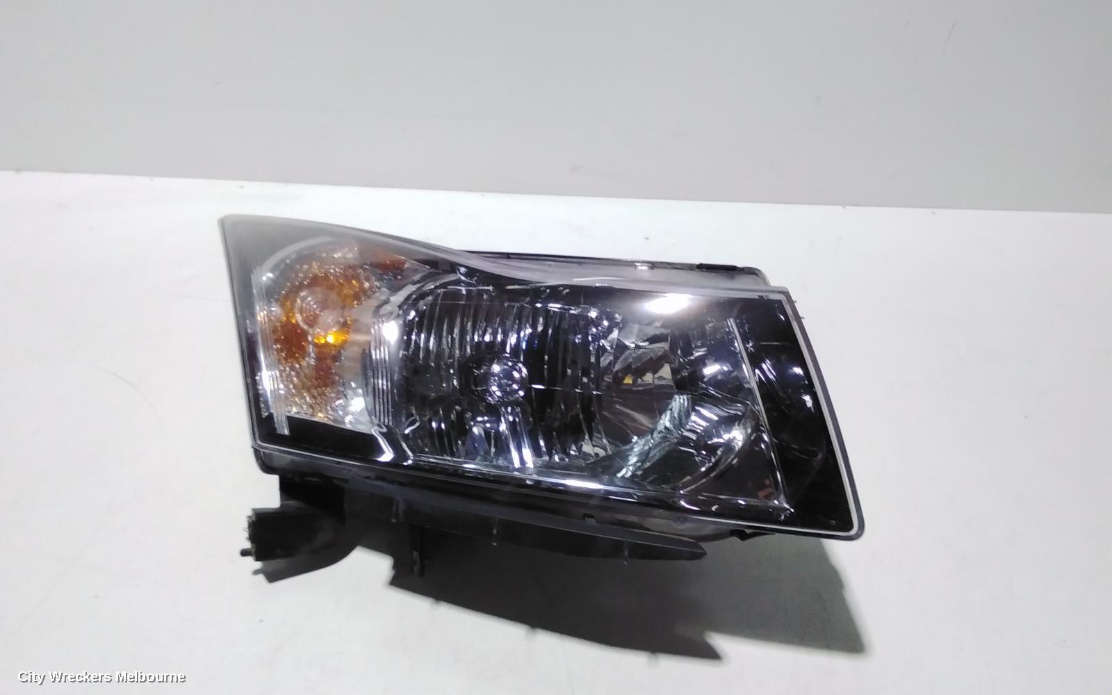 HOLDEN CRUZE RIGHT HEADLAMP, JG, 03/2009 - 02/2011