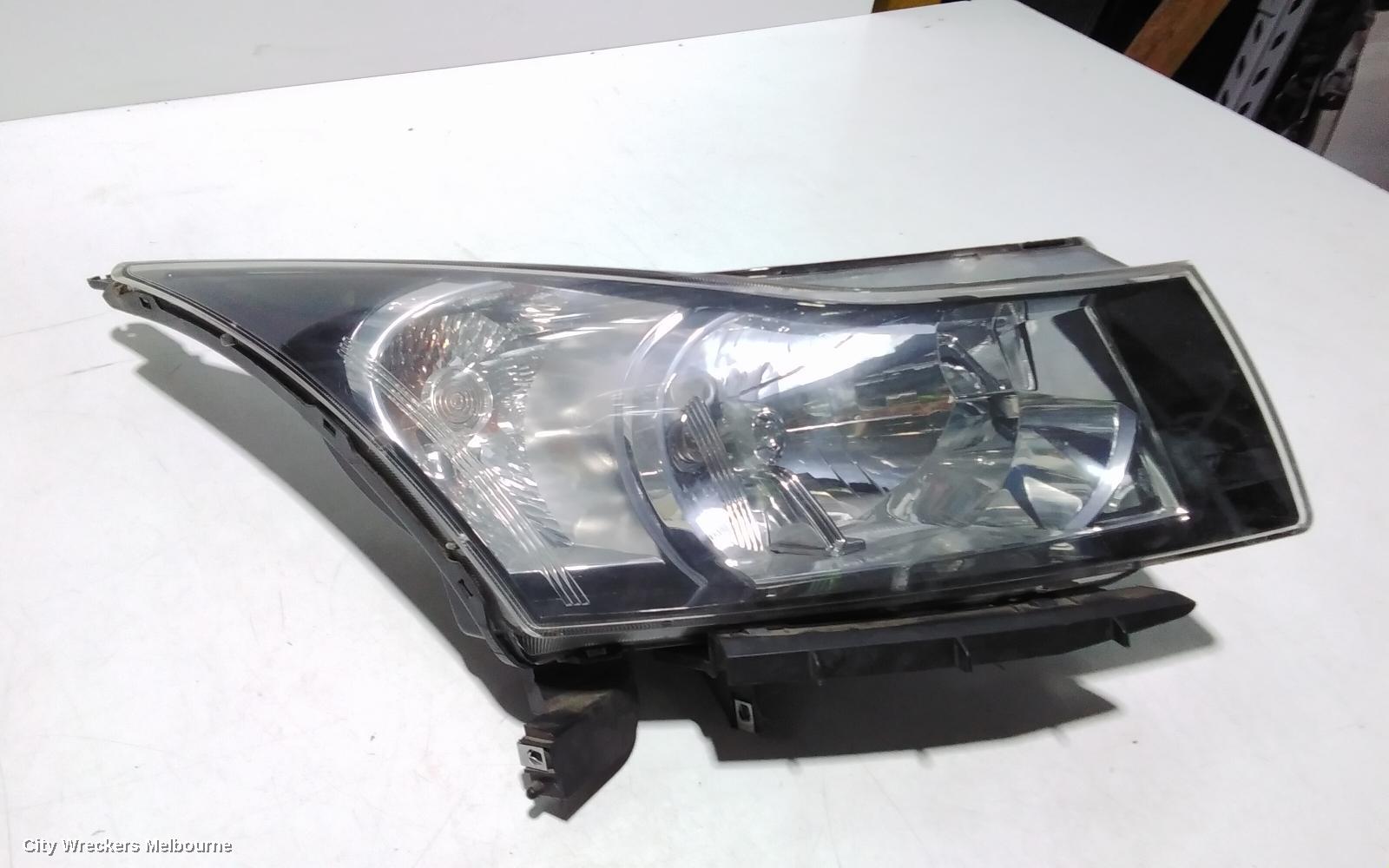 HOLDEN CRUZE RIGHT HEADLAMP, JG, 03/2009 - 02/2011