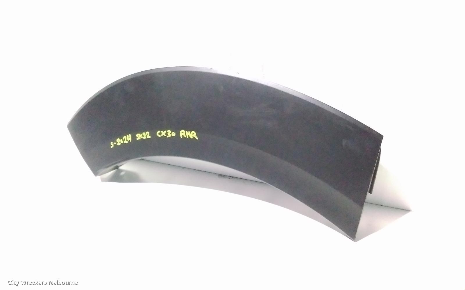 MAZDA CX30 WHEEL ARCH FLARE, RH REAR, IN GUARD, DM, 10/2019 ONWARDS