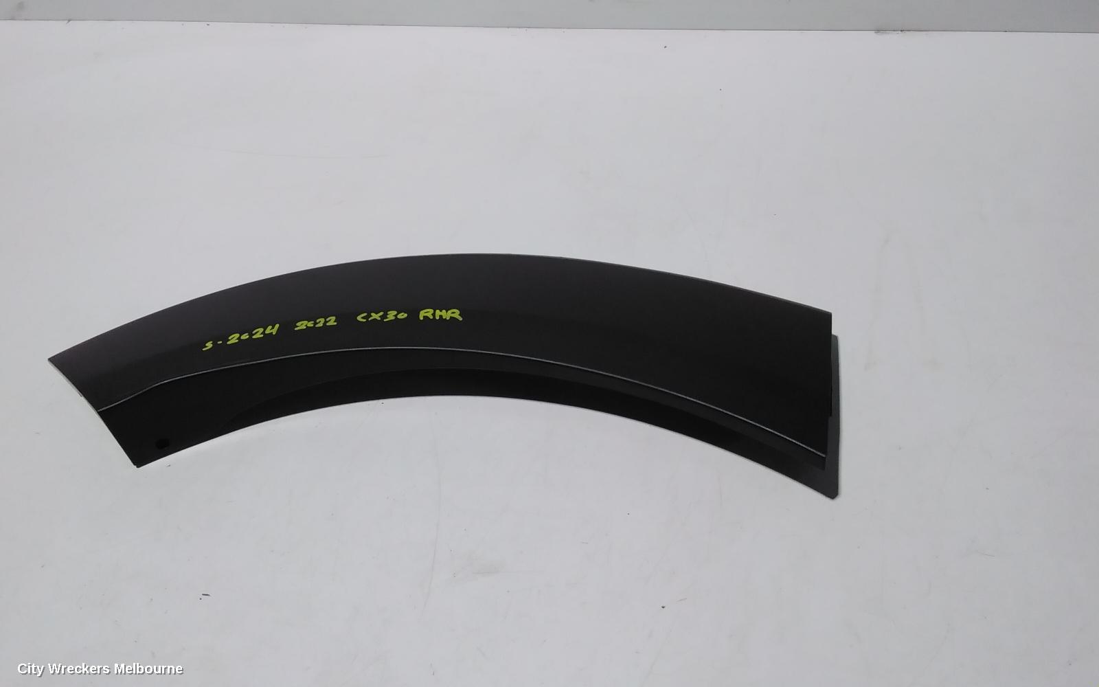 MAZDA CX30 WHEEL ARCH FLARE, RH REAR, IN GUARD, DM, 10/2019 ONWARDS