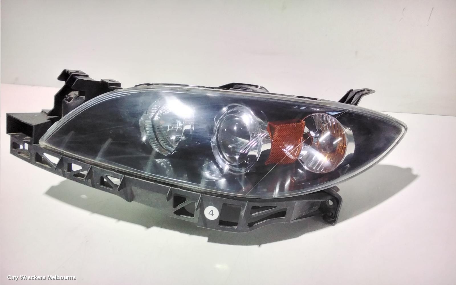 MAZDA 3 LEFT HEADLAMP, BK, SEDAN, NON HID, MANUAL ADJUST TYPE, 10/2003 - 04/2009