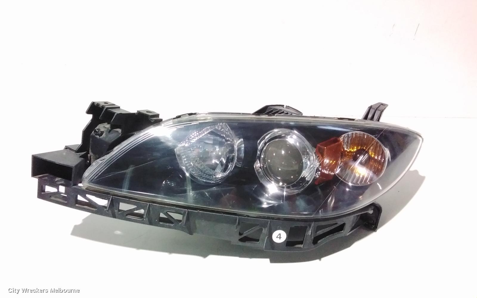 MAZDA 3 LEFT HEADLAMP, BK, SEDAN, NON HID, MANUAL ADJUST TYPE, 10/2003 - 04/2009